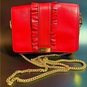 Michael Kors red leather cross body with gold tone hardware